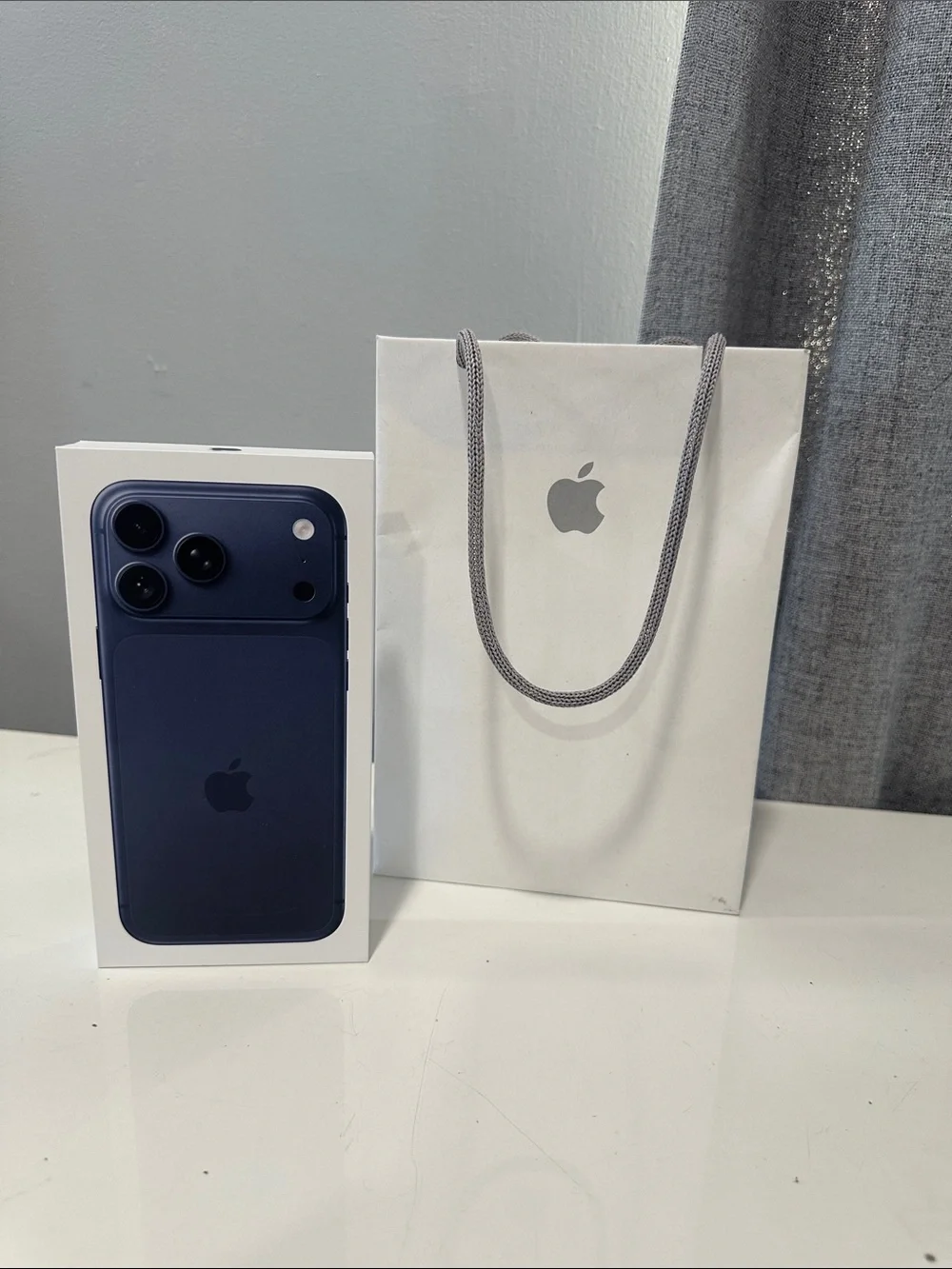 Authentic empty Apple iPhone 17Pro Max - Midnight Blue Finish box and bag.